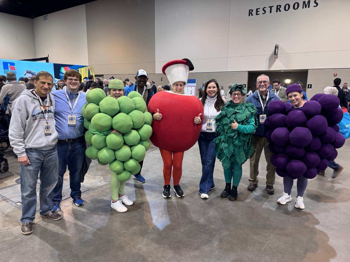 Attendees in fruit costumes at LTM Together: Omaha